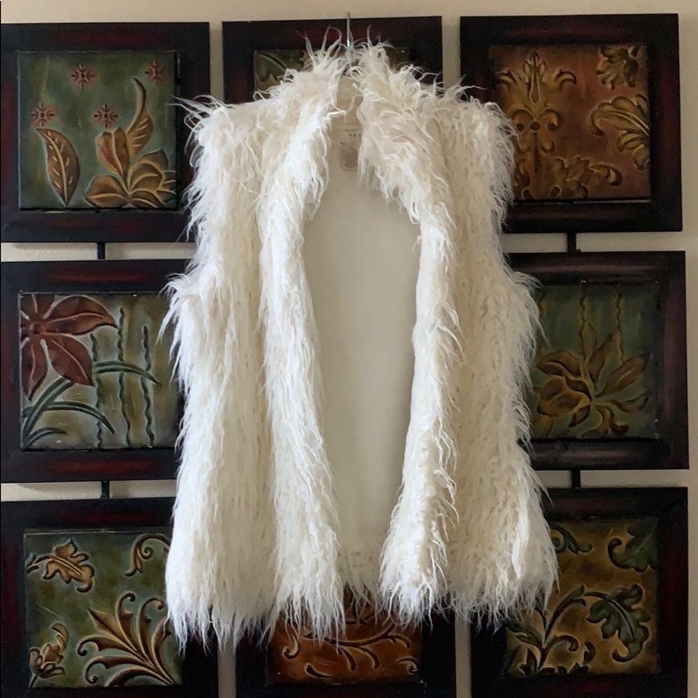 White faux fur vest